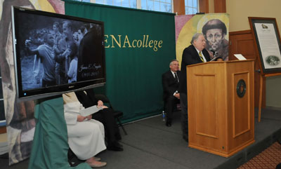 Dennis Winger '69 addresses the crowd during the Snyder Hall dedication ceremony. Winger shared a touching story about the photograph of Jim Snyder pictured to the left.  